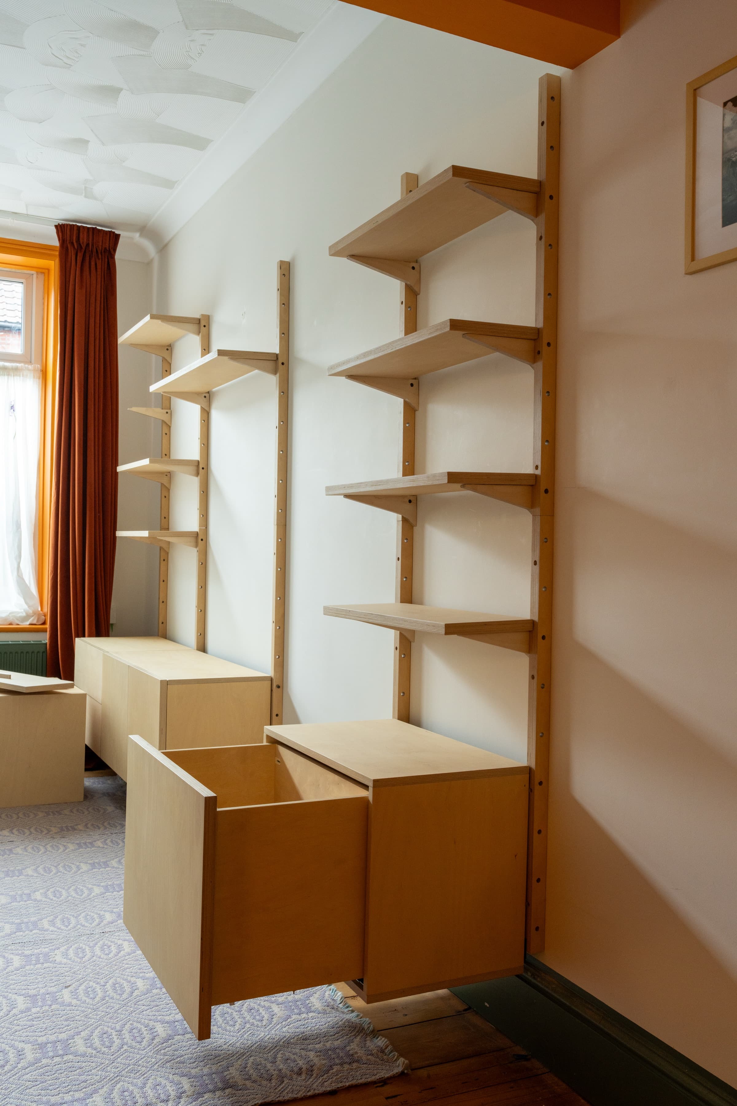 MESTRA shelving system being assembled