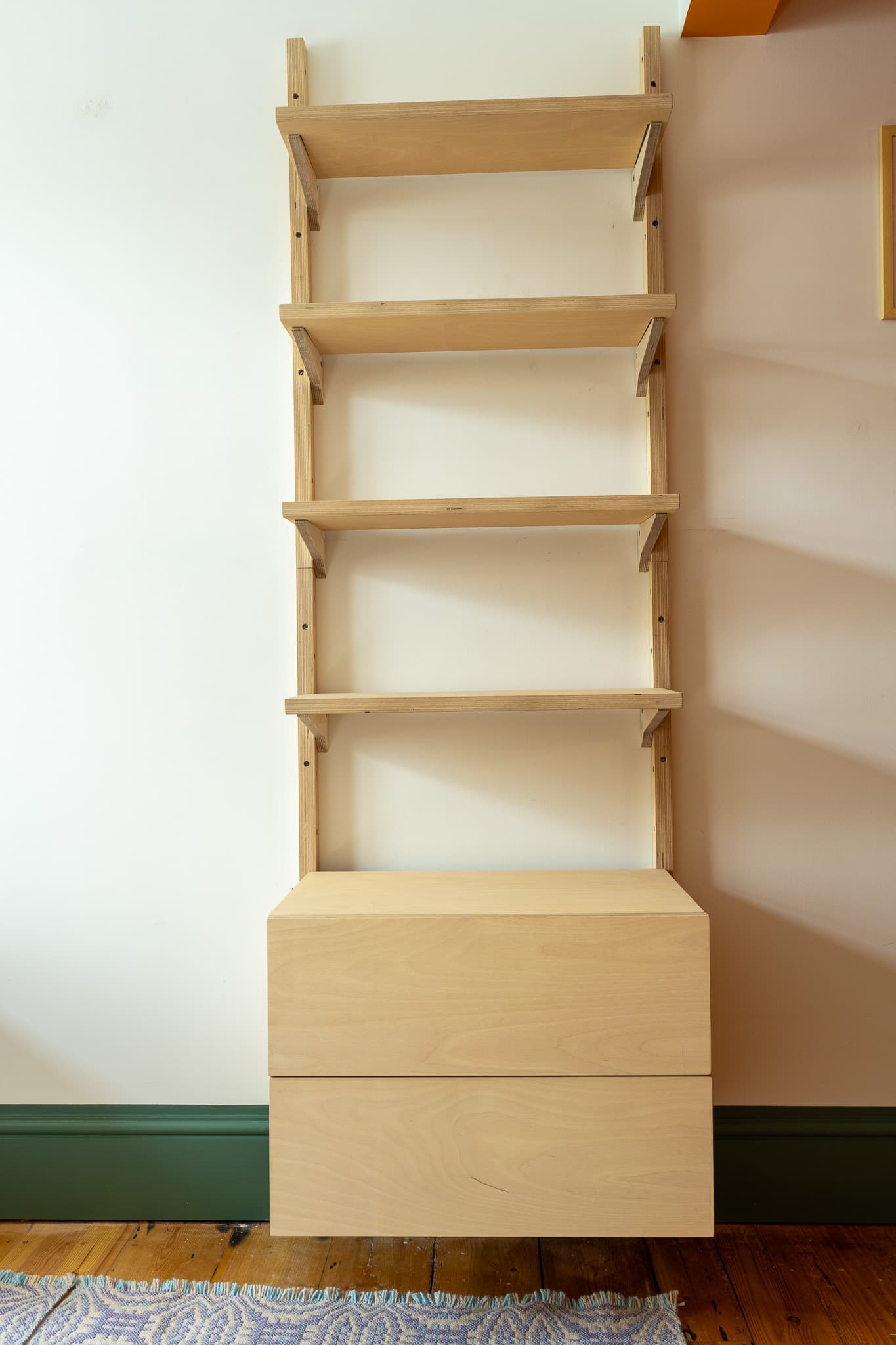 MESTRA birch plywood shelving and drawer unit viewed from the front